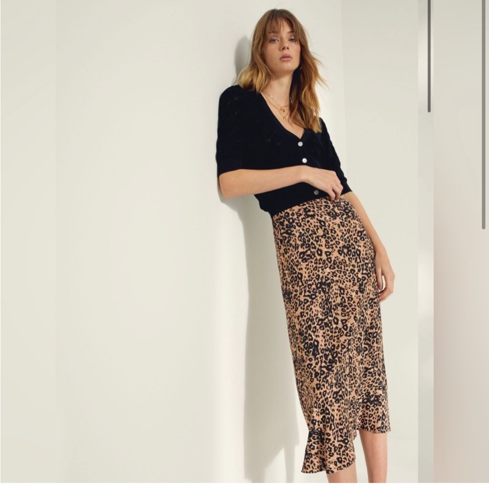 Aritzia leopard print midi skirt.